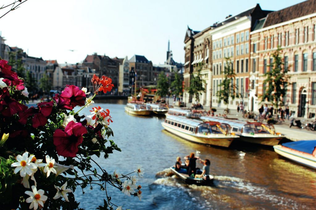 boats on water in amsterdam