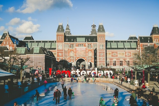 big amsterdam sign and lots of people