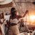 tanned girl in a white suit